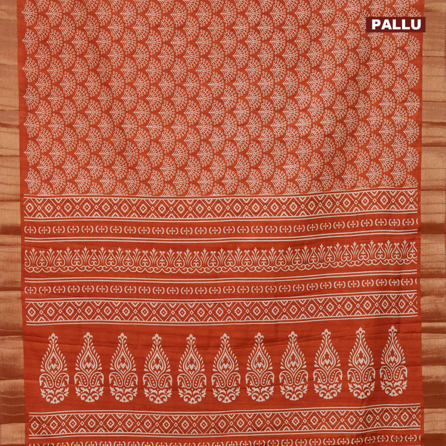 Semi tussar saree rustic orange with allover butta prints and zari woven border