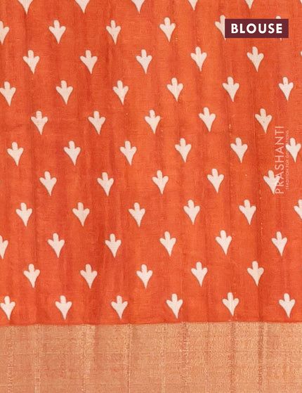 Semi tussar saree rustic orange with allover butta prints and zari woven border