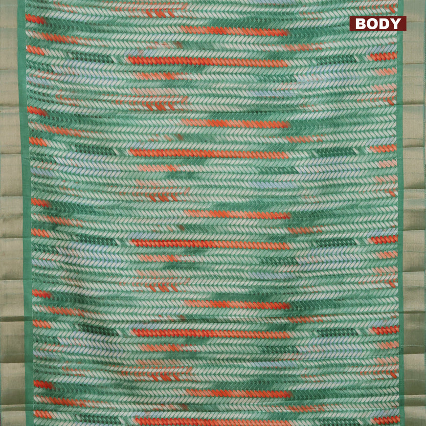 Semi tussar saree green shade with allover prints and zari woven border