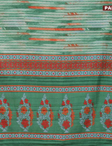 Semi tussar saree green shade with allover prints and zari woven border