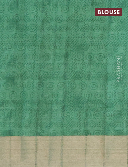 Semi tussar saree green shade with allover prints and zari woven border