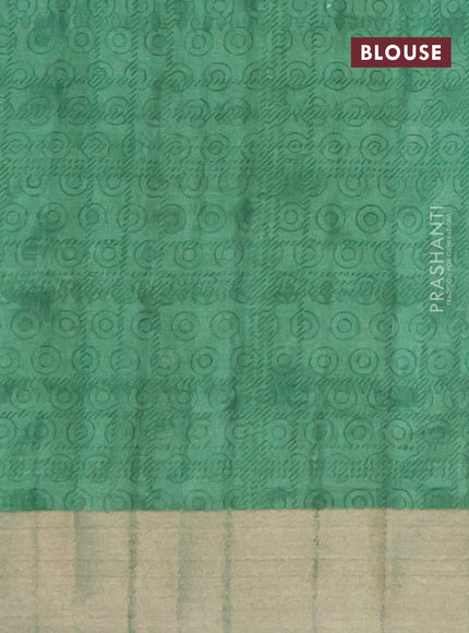 Semi tussar saree green shade with allover prints and zari woven border