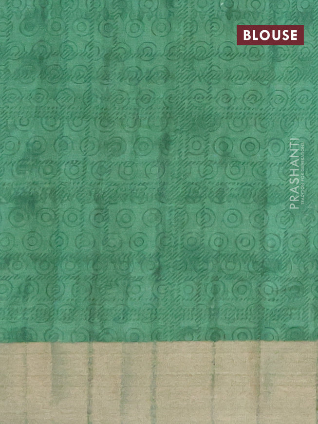 Semi tussar saree green shade with allover prints and zari woven border