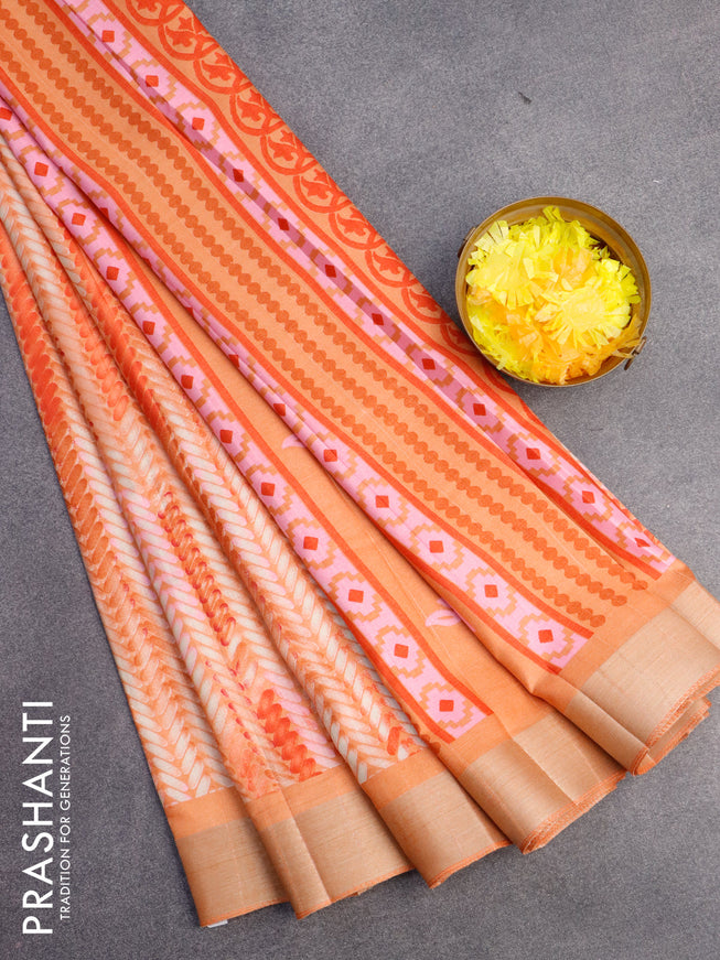 Semi tussar saree pale orange with allover prints and zari woven border