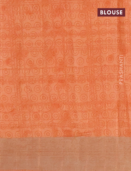 Semi tussar saree pale orange with allover prints and zari woven border