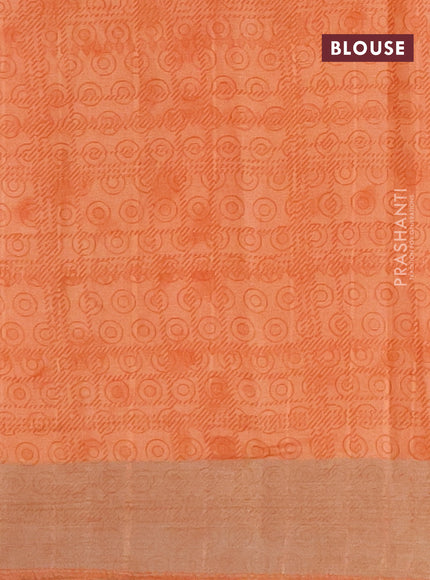 Semi tussar saree pale orange with allover prints and zari woven border