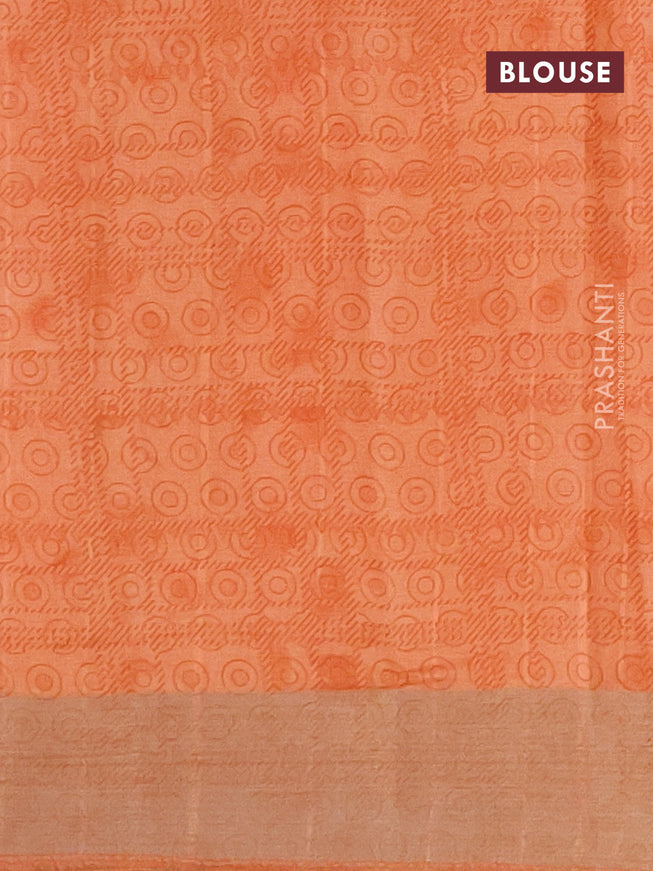 Semi tussar saree pale orange with allover prints and zari woven border