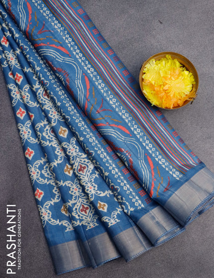 Semi tussar saree blue with allover prints and zari woven border