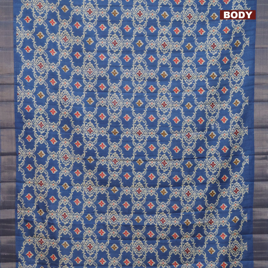 Semi tussar saree blue with allover prints and zari woven border