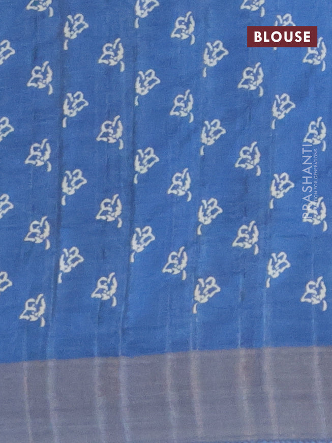 Semi tussar saree blue with allover prints and zari woven border