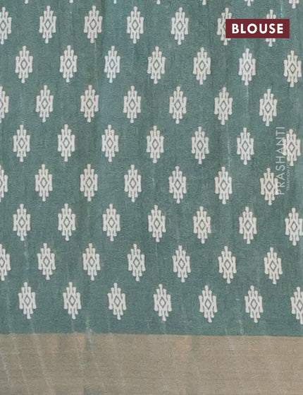 Semi tussar saree green shade with allover geometric prints and zari woven border