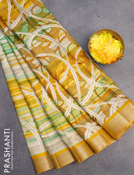 Semi tussar saree mustard yellow and multi colour with allover prints and zari woven border