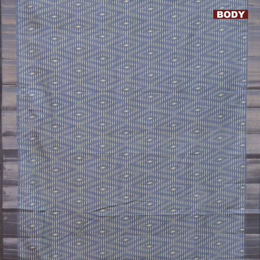 Semi tussar saree bluish grey with allover prints and zari woven border