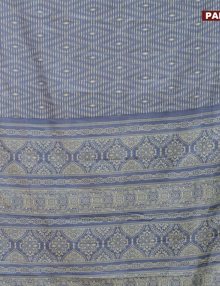 Semi tussar saree bluish grey with allover prints and zari woven border