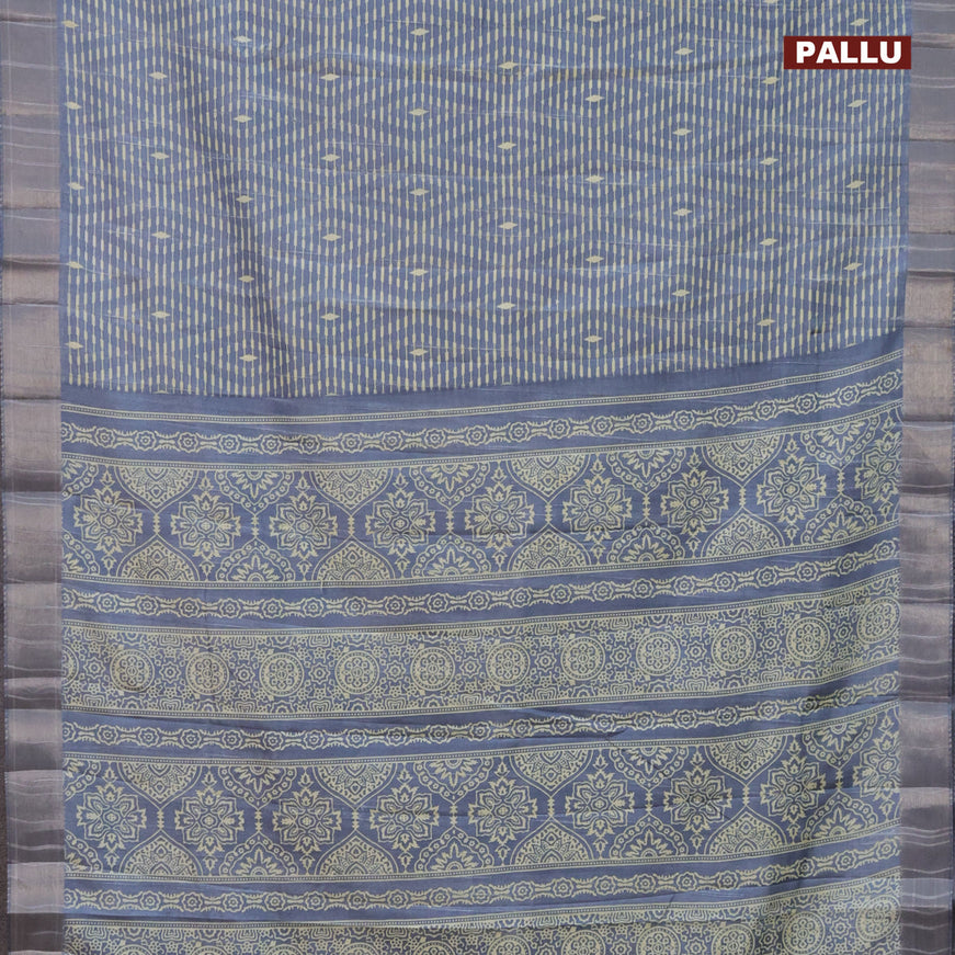 Semi tussar saree bluish grey with allover prints and zari woven border