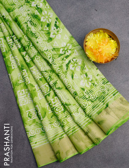 Semi tussar saree light green with allover tie & dye prints and zari woven border