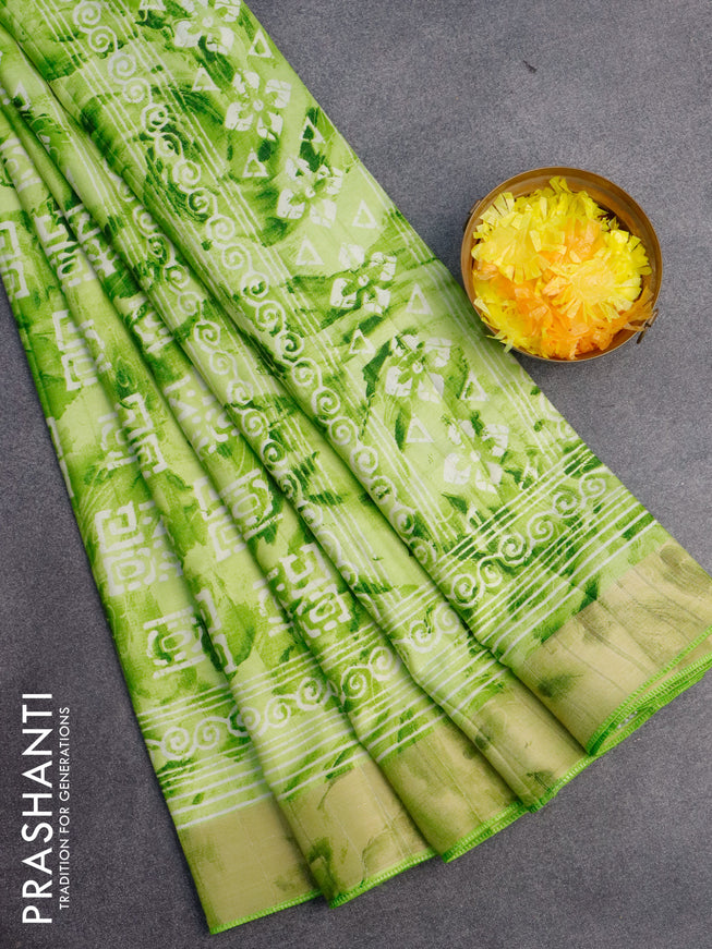 Semi tussar saree light green with allover tie & dye prints and zari woven border