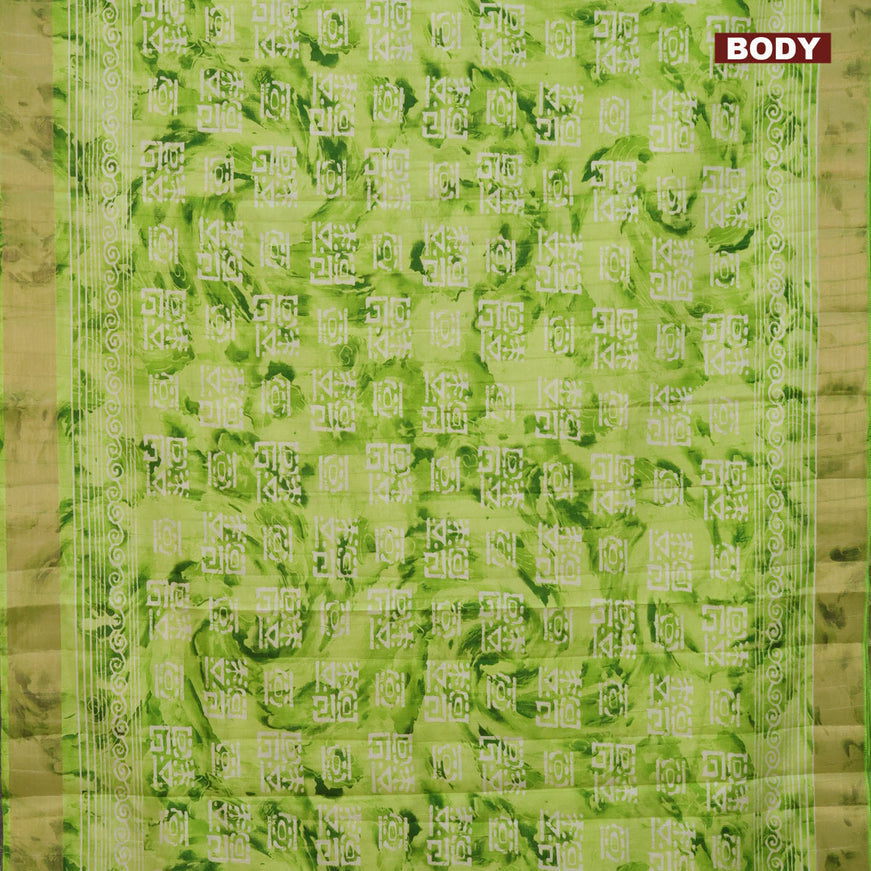 Semi tussar saree light green with allover tie & dye prints and zari woven border