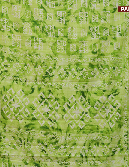 Semi tussar saree light green with allover tie & dye prints and zari woven border