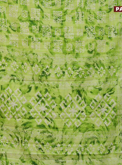 Semi tussar saree light green with allover tie & dye prints and zari woven border