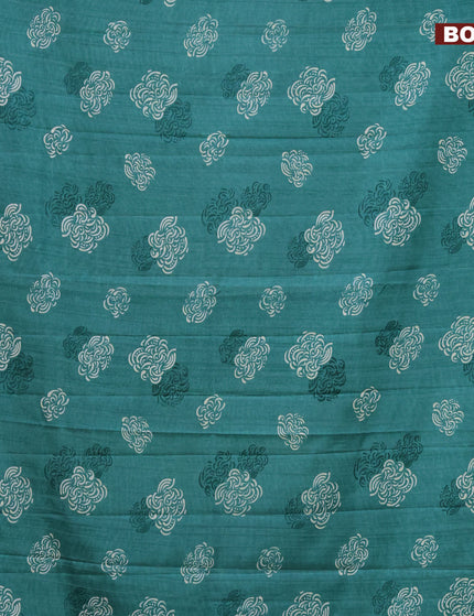 Semi tussar saree teal green shade with allover prints and zari woven border