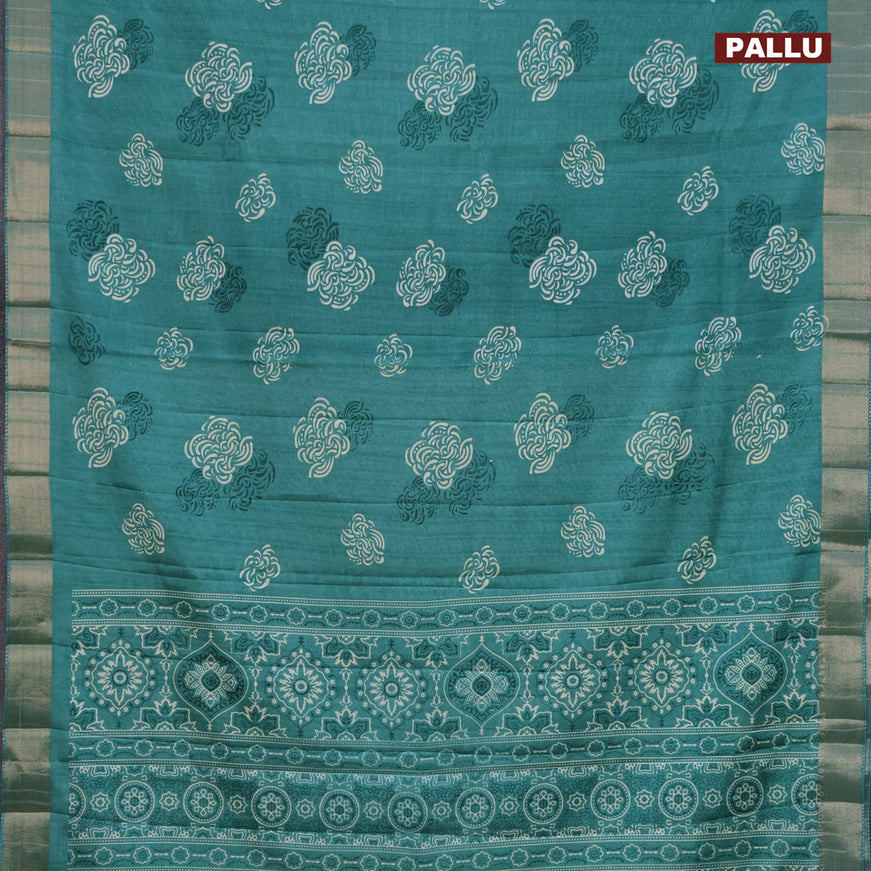 Semi tussar saree teal green shade with allover prints and zari woven border