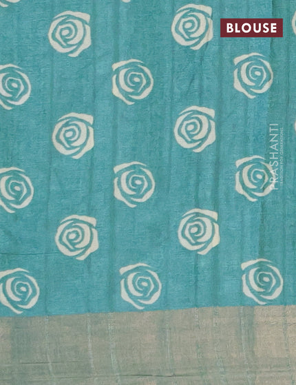 Semi tussar saree teal green shade with allover prints and zari woven border