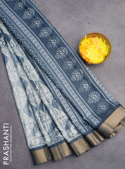 Semi tussar saree grey with allover tie and dye prints & batik prints and zari woven border