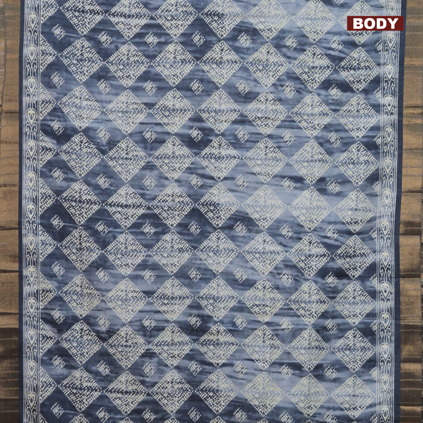 Semi tussar saree grey with allover tie and dye prints & batik prints and zari woven border