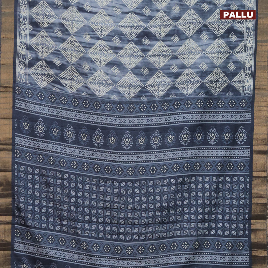 Semi tussar saree grey with allover tie and dye prints & batik prints and zari woven border