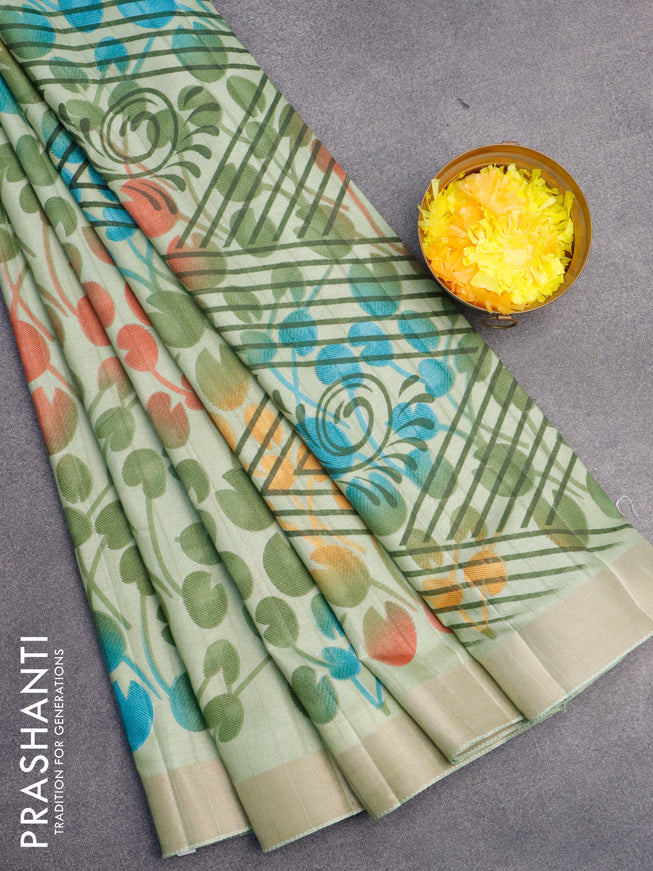 Semi tussar saree pastel green with allover prints and zari woven border