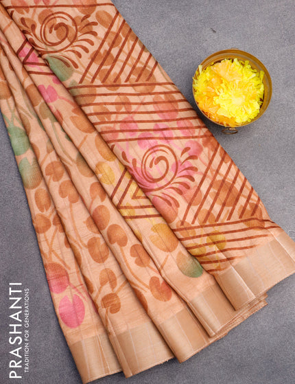 Semi tussar saree pastel peach shade with allover prints and zari woven border