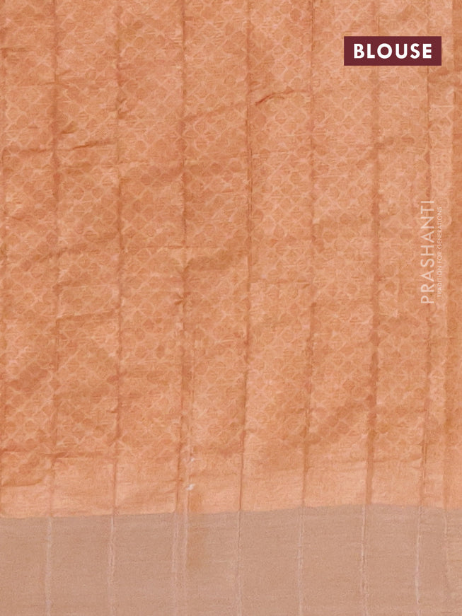 Semi tussar saree pastel peach shade with allover prints and zari woven border