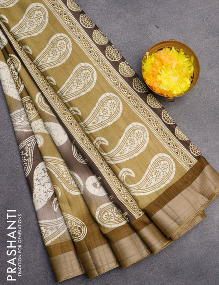 Semi tussar saree grey shade and elaichi green with allover paisley prints and zari woven border