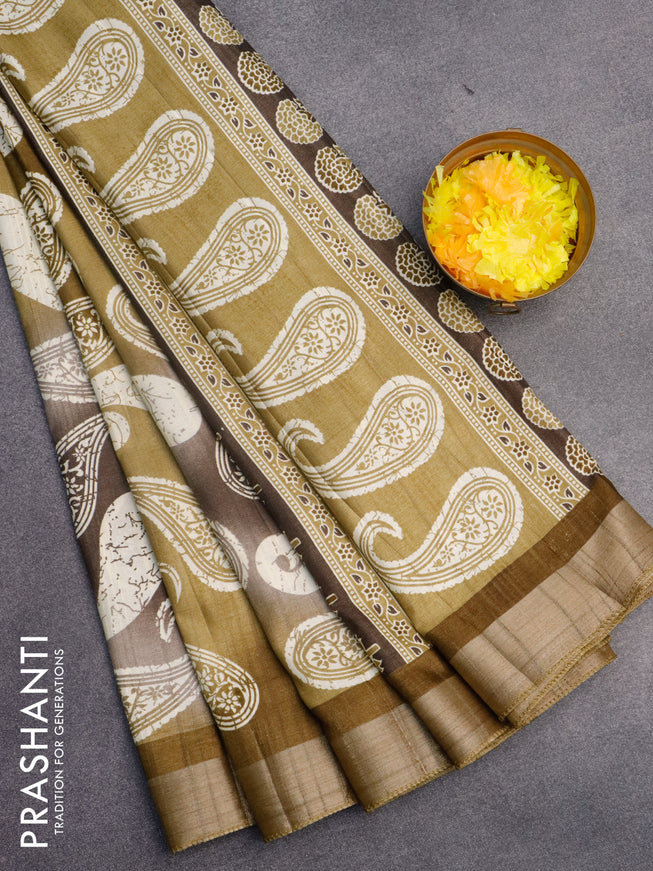 Semi tussar saree grey shade and elaichi green with allover paisley prints and zari woven border