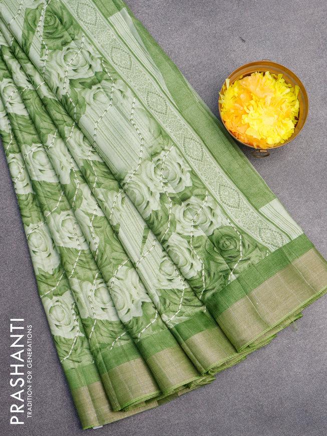 Semi tussar saree green shade with allover prints and zari woven border