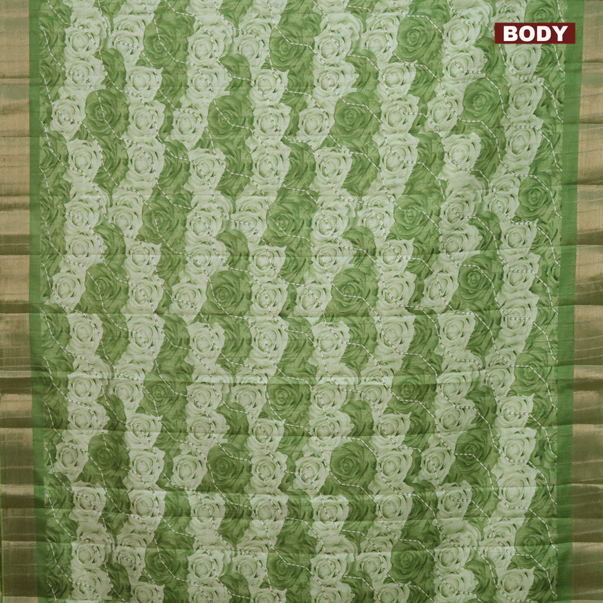 Semi tussar saree green shade with allover prints and zari woven border