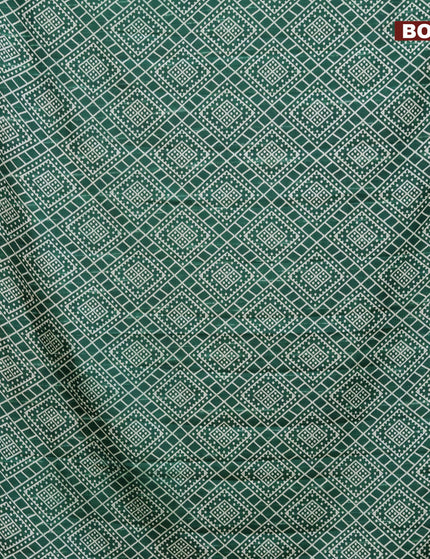 Semi tussar saree green with allover geometric prints and zari woven border