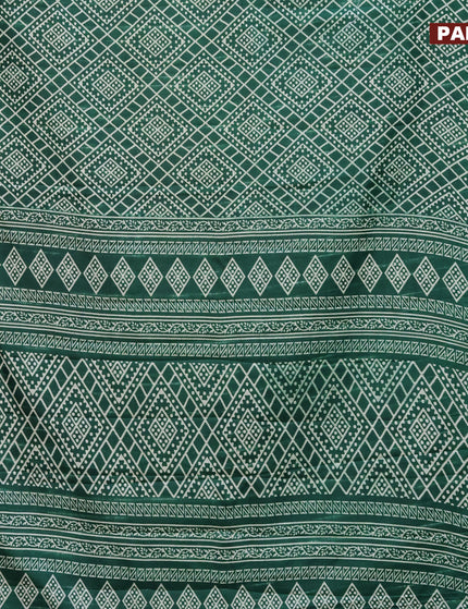 Semi tussar saree green with allover geometric prints and zari woven border