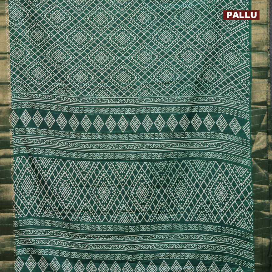 Semi tussar saree green with allover geometric prints and zari woven border