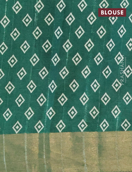 Semi tussar saree green with allover geometric prints and zari woven border