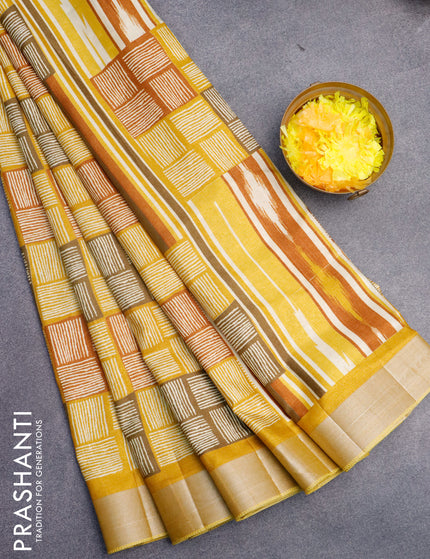 Semi tussar saree mustard yellow with allover geometric prints and zari woven border