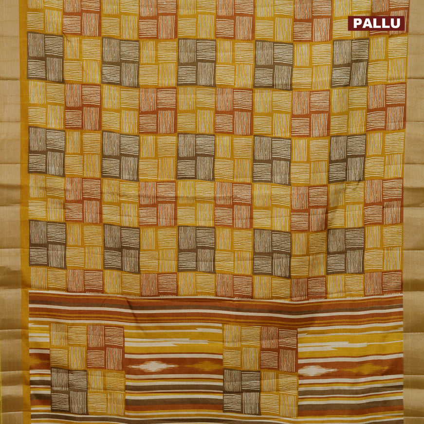 Semi tussar saree mustard yellow with allover geometric prints and zari woven border