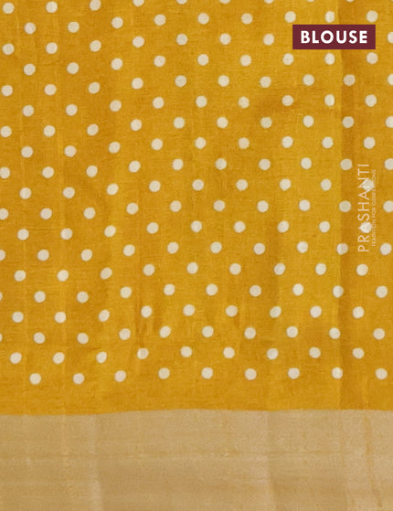 Semi tussar saree mustard yellow with allover geometric prints and zari woven border