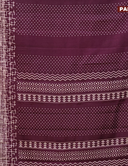 Semi tussar saree wine shade with allover geometric prints and zari woven border