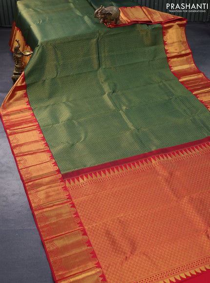 Pure kanjivaram silk saree green and red with allover zari woven brocade weaves and long rich zari woven border