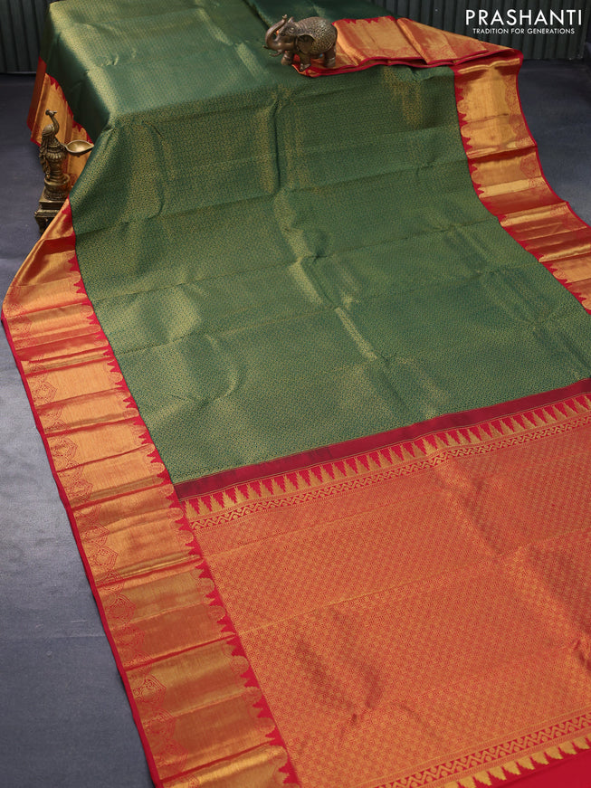 Pure kanjivaram silk saree green and red with allover zari woven brocade weaves and long rich zari woven border