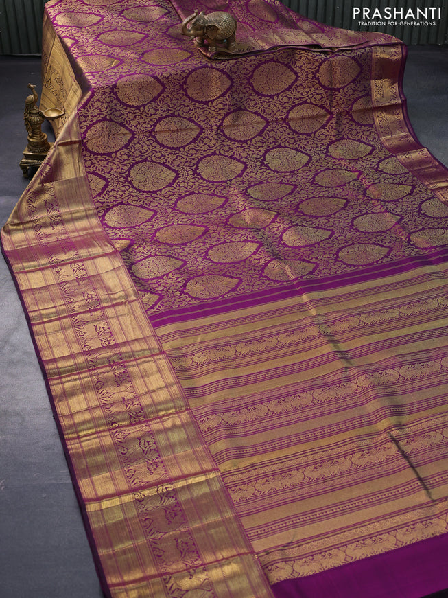 Pure kanjivaram silk saree purple with allover zari woven brocade weaves and long rich zari woven border