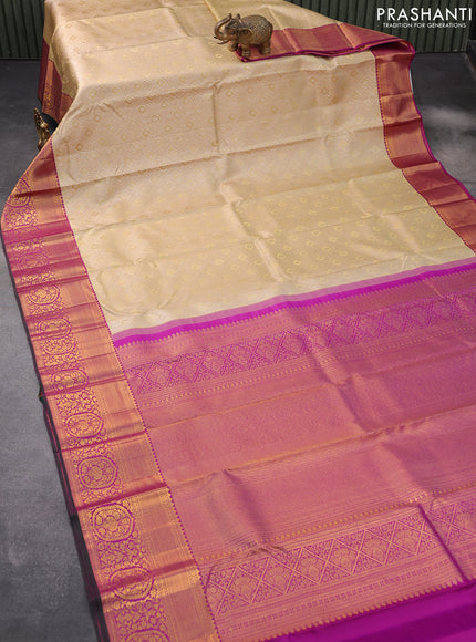 Pure kanjivaram silk saree beige and purple with allover silver zari woven brocade weaves and rich zari woven floral border