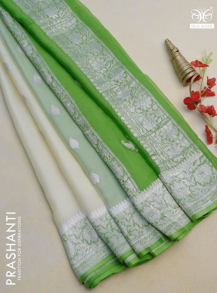 Pure banarasi chiffon silk saree cream and light green with silver zari woven buttas and silver zari woven border